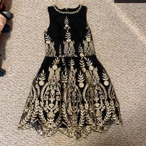 Gold and black dress. No flaws